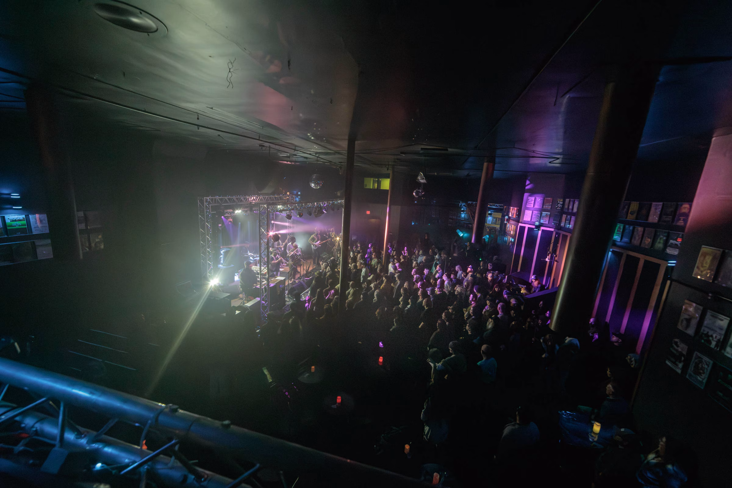 Karl Denson seen performing on stage to a packed house from the Private Suite above the bar, Lost on Main, Chico, CA
