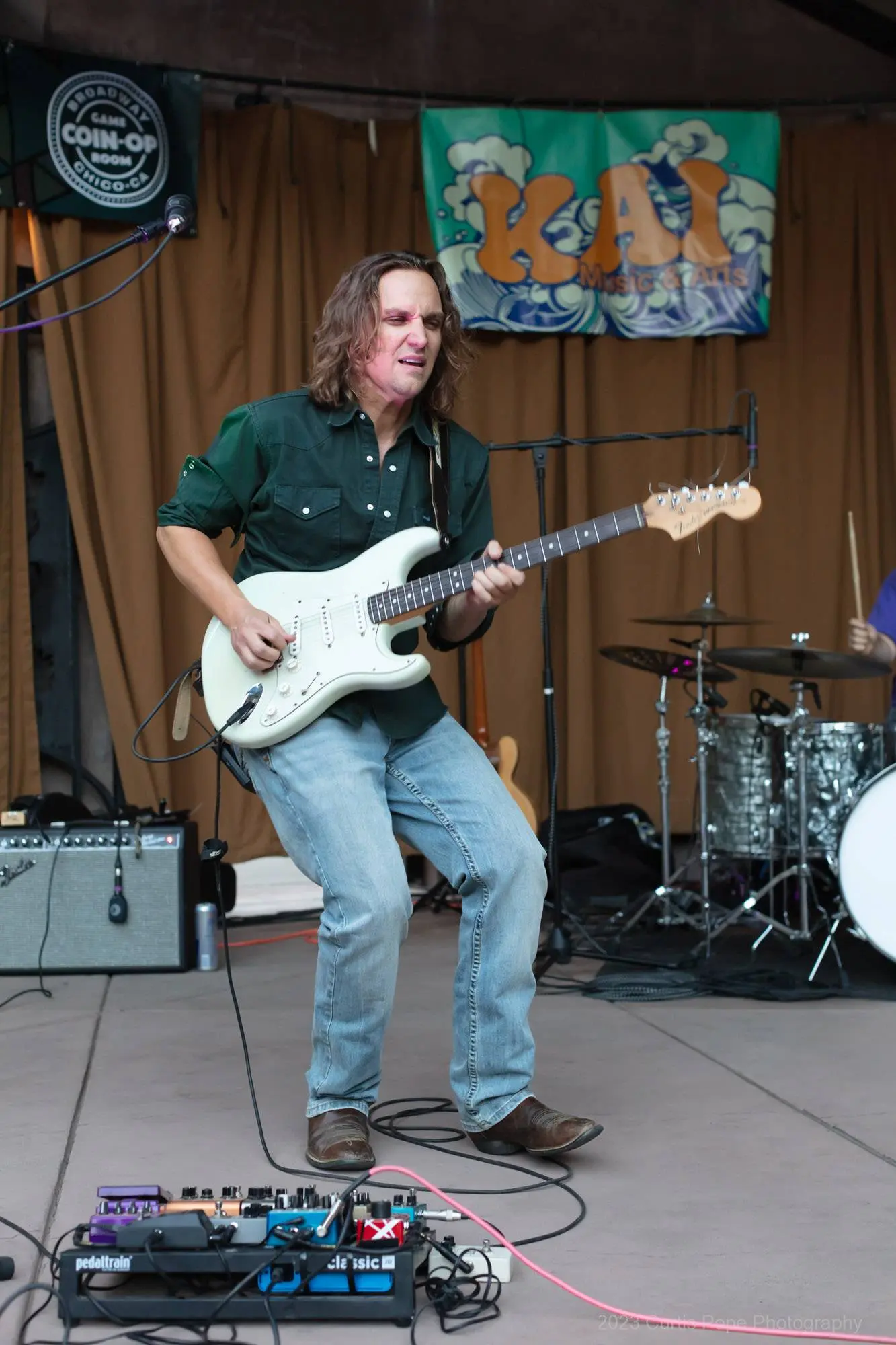 The Michael Russell Trio performing for the 2023 Friday Night Concert series in Plaza Park.