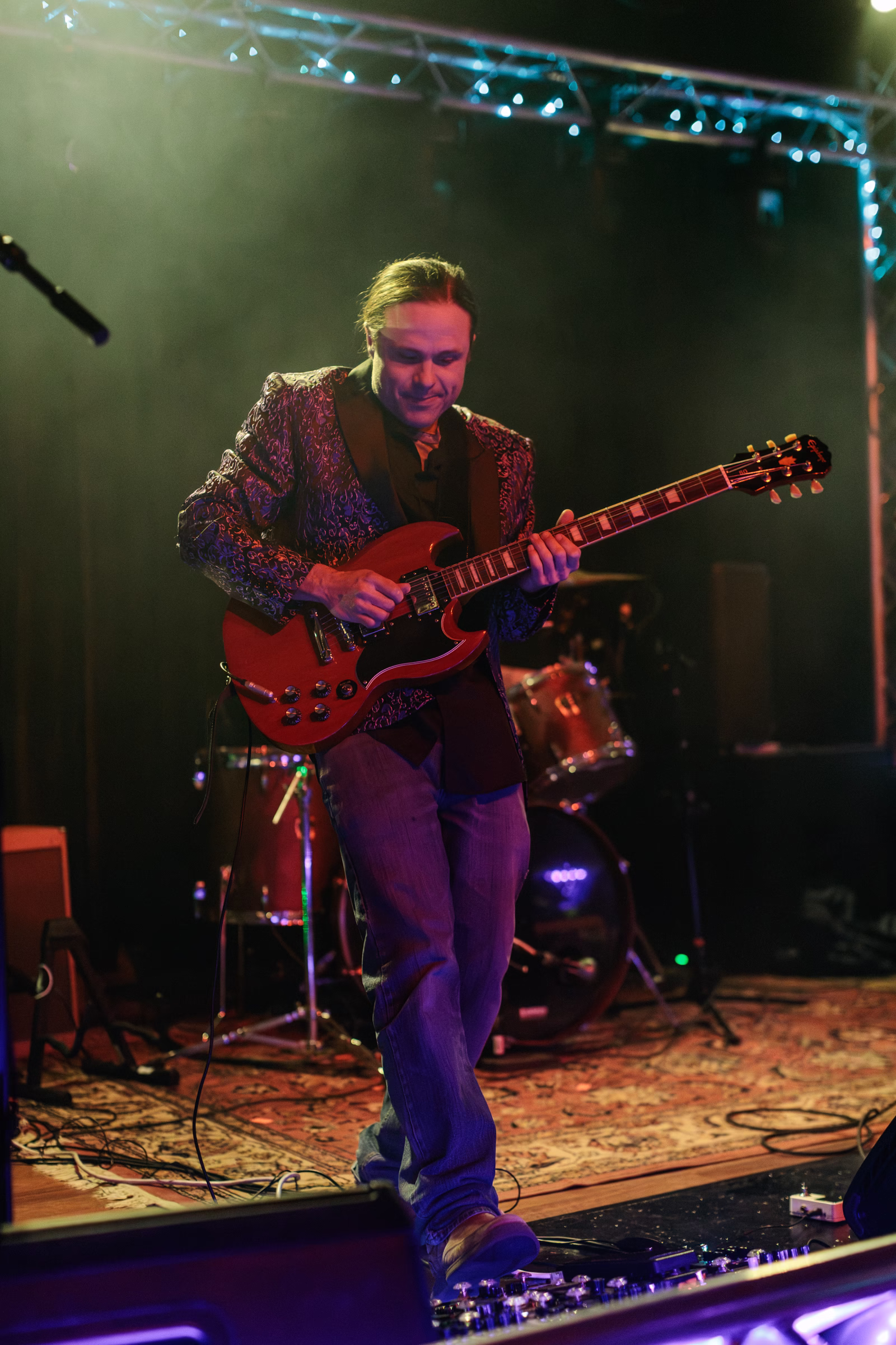 August Kube performs with his band, Swamp Zen, during the 2026 New Year's Eve celebration at Lost on Main. Black and white image